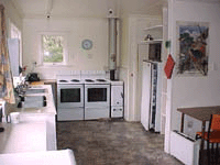 The kitchen with stoves and fridges